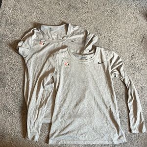 Pair of Nike dri fit Team Canada workout shirts